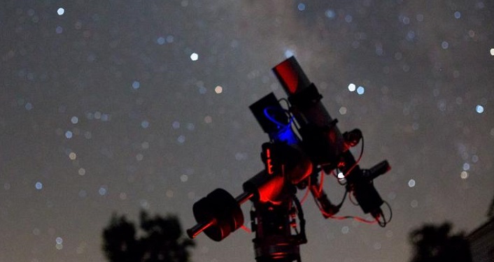 image of nighttime sky with telescope and stars used during Night Under the Stars