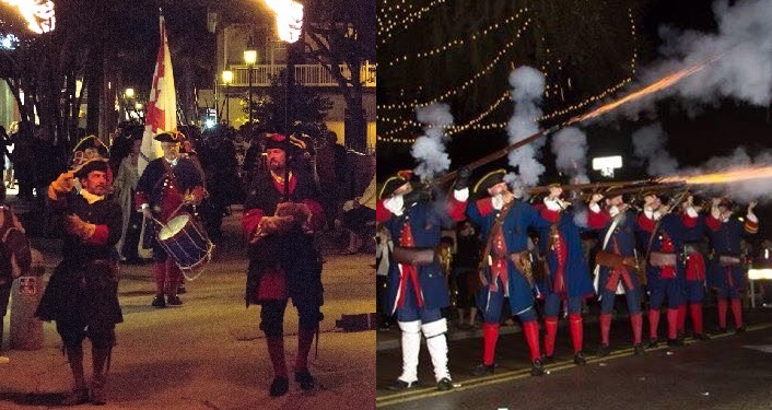 2 images of reenactors in period garb for Colonial Night Watch Torchlight Parade; left side reenactors strolling down the street, one carrying American flag; image to right of soldiers firing the muskets for Volley of Joy