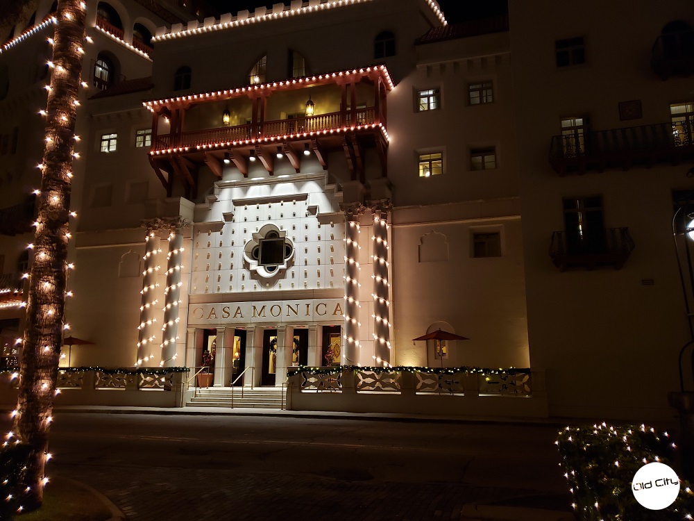 Image contains the front doors of a hotel.